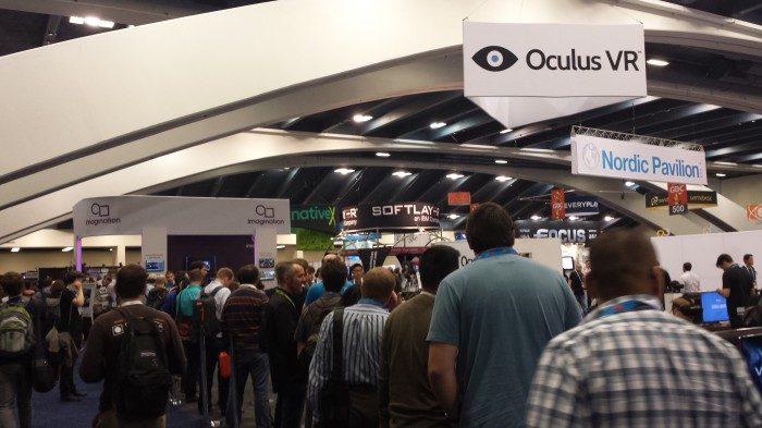 The Oculus booth is teeming with activity.
